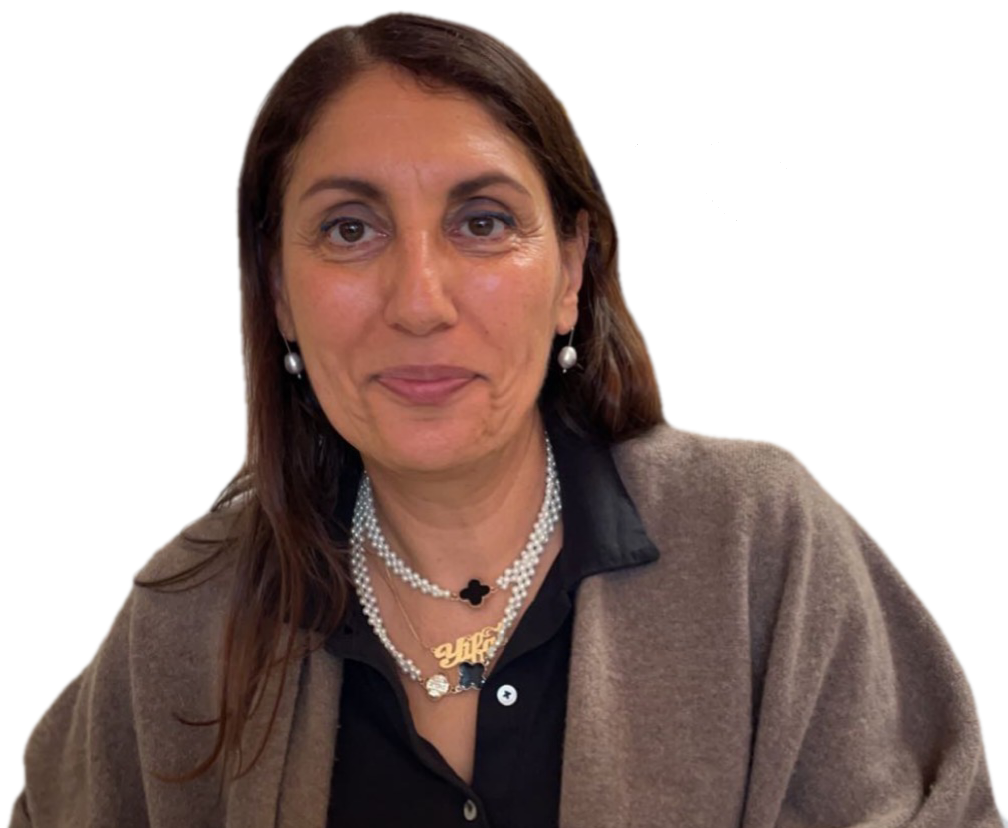 A woman wearing a black shirt and brown jacket.